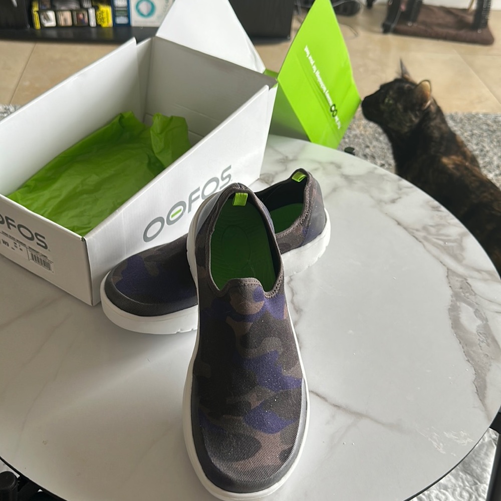Oofos Women’s OOmg EeZee Low Shoe Camo.  Camo has been discontinued.